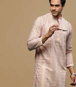 Sanwara men's printed orange chikankari kurta with alluring sequin accents.