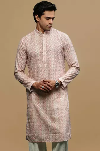 Sanwara men's printed orange chikankari kurta with alluring sequin accents.