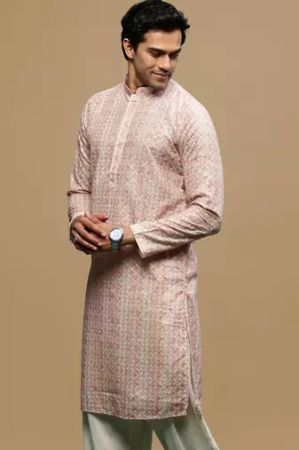 Sanwara men's printed orange chikankari kurta with alluring sequin accents.
