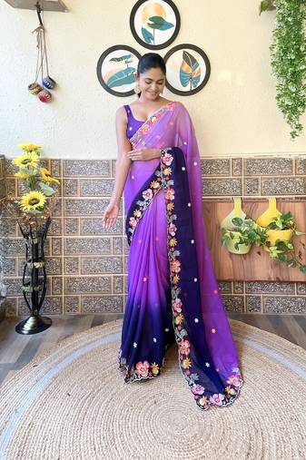 Purple georgette saree with bollywood style pedding and embroidery work