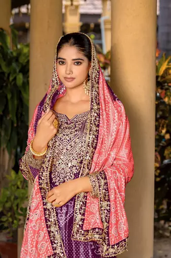 Purple chinon bandhani printed heavy salwar kameez with jari and mirror embroidery work