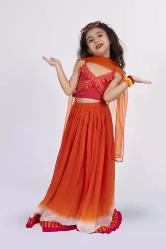 Twisha strppy crisscrossed  frilled top with ghagra set - orange & pink