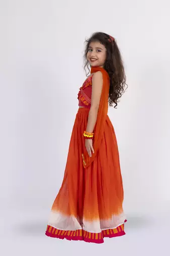 Twisha strppy crisscrossed  frilled top with ghagra set - orange & pink