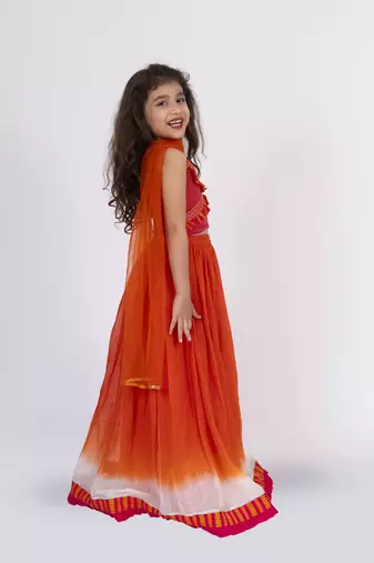 Twisha strppy crisscrossed  frilled top with ghagra set - orange & pink