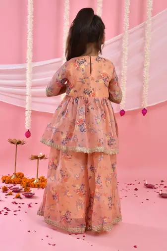 Girl's peach floral kurta with flared palazzo set