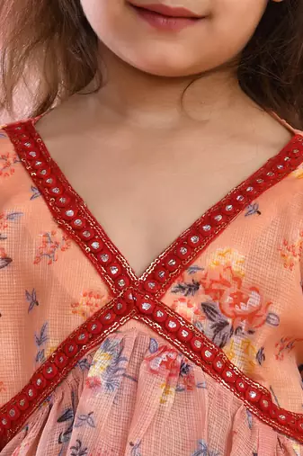 Girl's peach floral kurta with flared palazzo set