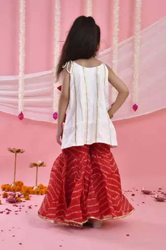 Girl's white and red kurta sharara set with dupatta