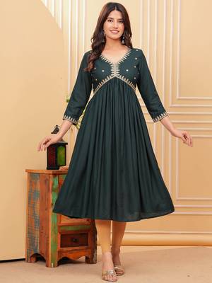 Women's rayon solid designer ethnic embroidered anarkali/flared gown kurti for wedding wear & party wear 1