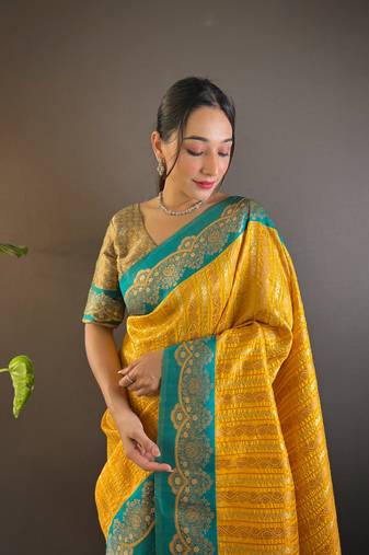 Yellow contrast zari woven silk saree with satin unique border