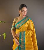 Yellow contrast zari woven silk saree with satin unique border