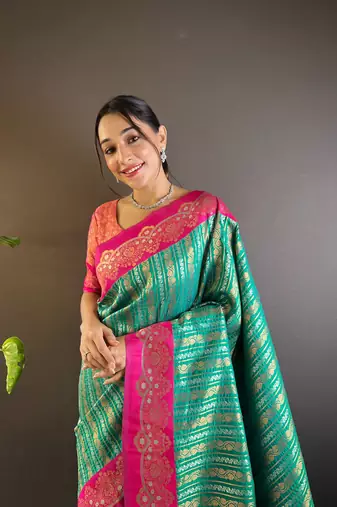 Green contrast zari woven silk saree with satin unique border