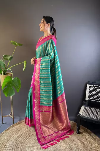 Green contrast zari woven silk saree with satin unique border