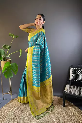 Sky contrast zari woven silk saree with satin unique border