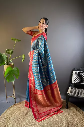 Blue contrast zari woven silk saree with satin unique border