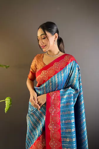 Blue contrast zari woven silk saree with satin unique border