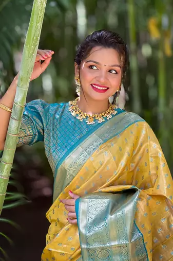 Yellow kanjivaram tissue silk traditional zari woven saree