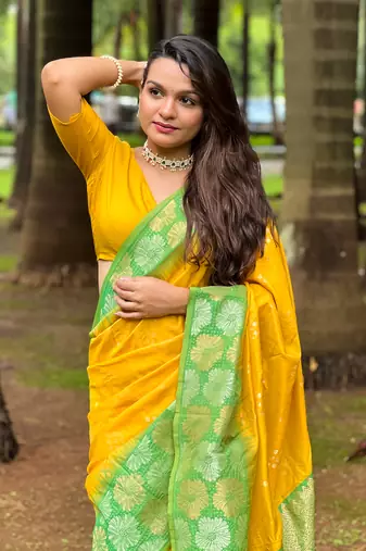 Yellow soft silk floral border contrast zari woven saree