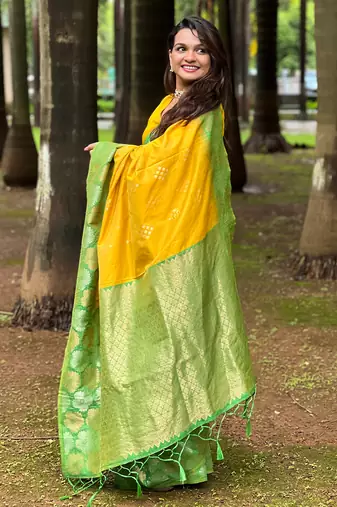 Yellow soft silk floral border contrast zari woven saree
