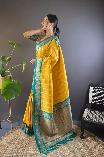 Yellow contrast zari woven silk saree with satin unique border