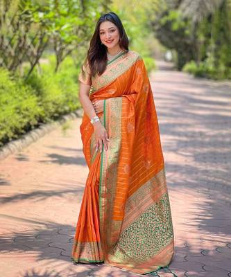 Orange soft silk contrast zari woven saree 1