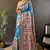 Rama blue tussar silk madhubani printed saree with zari woven border
