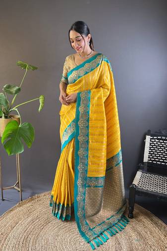 Yellow contrast zari woven silk saree with satin unique border