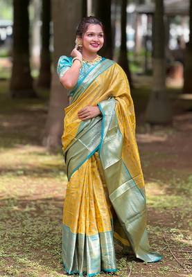 Yellow kanjivaram tissue silk traditional zari woven saree 1