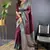 Brown soft silk floral border contrast zari woven saree