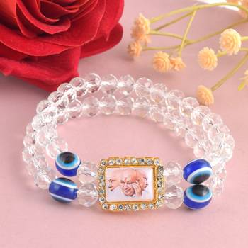 White crystal evil eye guruji pictoral bracelet 1