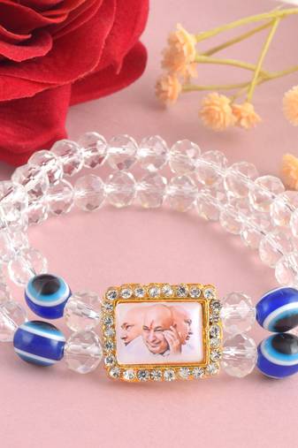 White crystal evil eye guruji pictoral bracelet