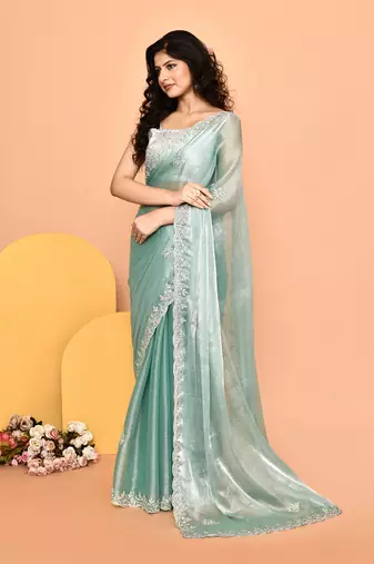 Alluring turquoise color designer handwork saree