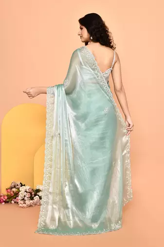 Alluring turquoise color designer handwork saree