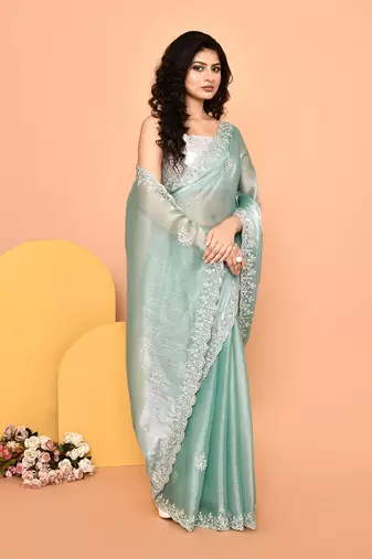 Alluring turquoise color designer handwork saree