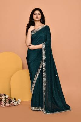Mesmerizing turquoise color designer handwork saree 1