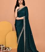 Mesmerizing turquoise color designer handwork saree