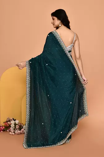 Mesmerizing turquoise color designer handwork saree
