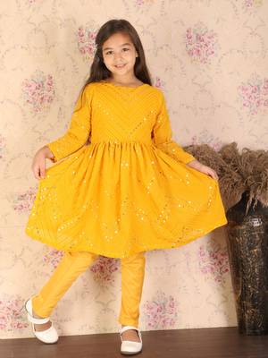  girls' yellow kurta and churidar 1
