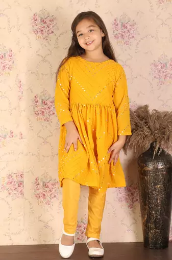  girls' yellow kurta and churidar