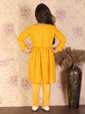  girls' yellow kurta and churidar 3