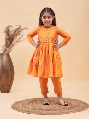  girls' orange kurta and pant set 1