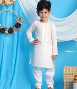 cream and white kurta pyjama set