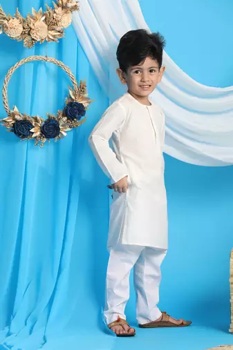cream and white kurta pyjama set