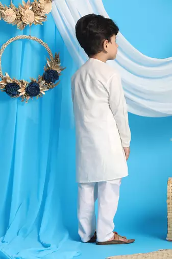 cream and white kurta pyjama set