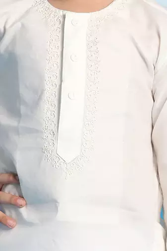 cream and white kurta pyjama set