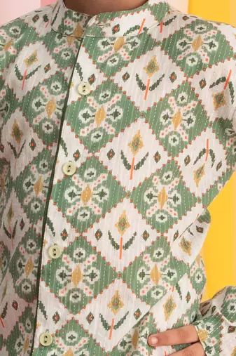 green and white kurta pyjama set