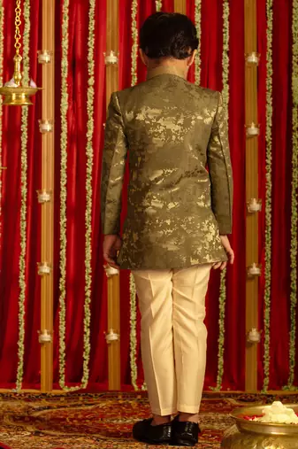 green and cream sherwani set