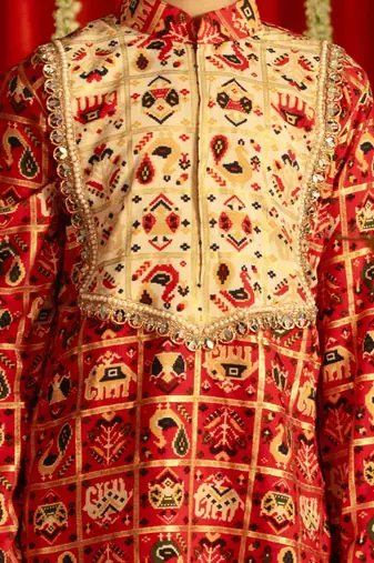 read and cream kurta and dhoti set