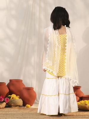  girls' yellow and white kurta, sharara and dupatta set 3