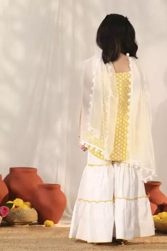  girls' yellow and white kurta, sharara and dupatta set