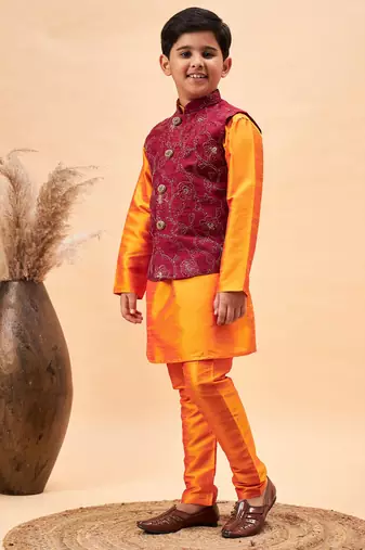 maroon nehru jacket and orange kurta and pyjama set